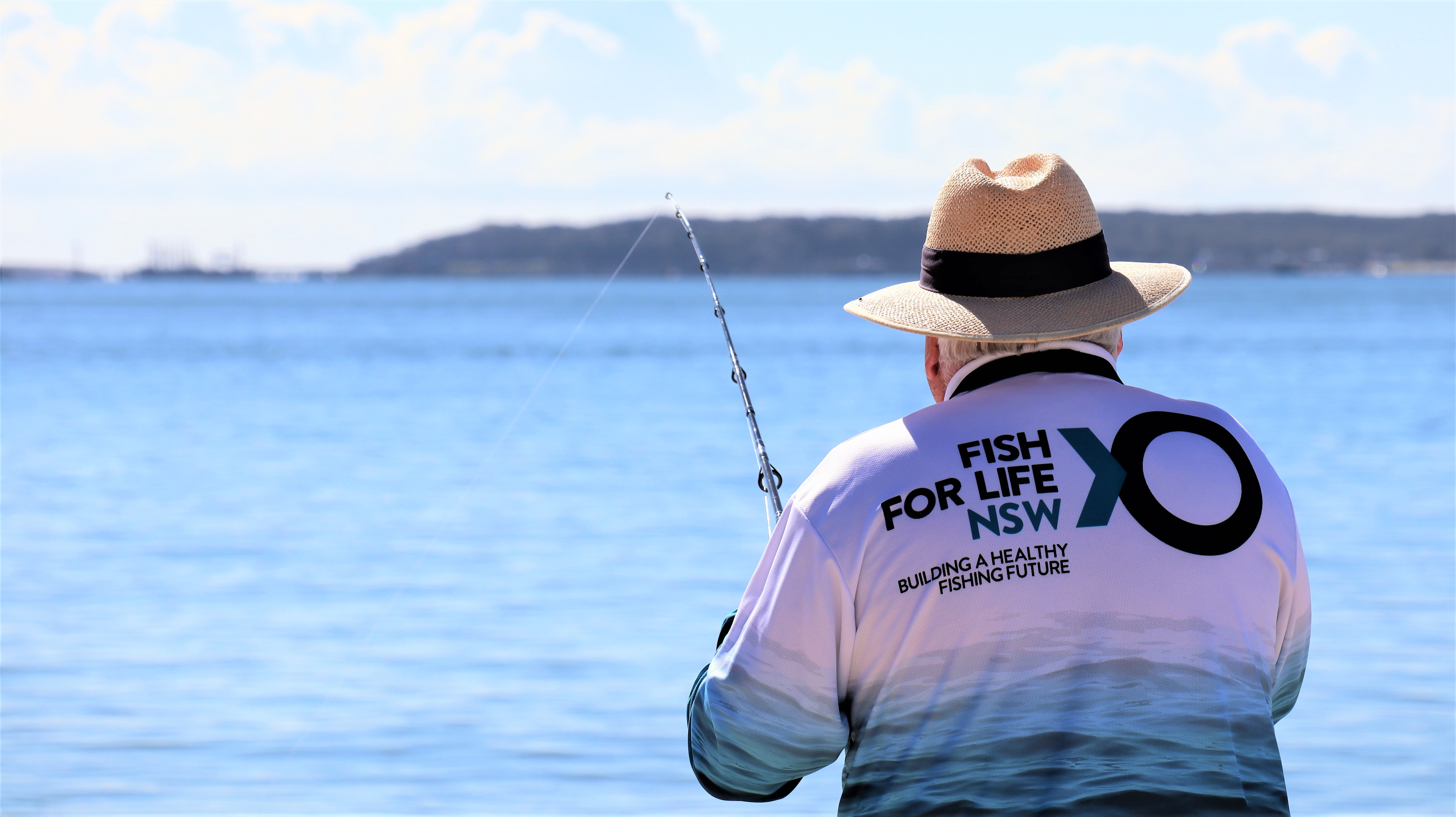 https://www.dpi.nsw.gov.au/__data/assets/image/0010/1203895/Fish-for-Life-logo-on-fisherman.jpg